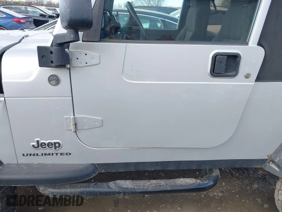 2005 Jeep Wrangler Unlimited with VIN 1J4FA44S25P340852, listed as a IAAI auction lot 41441671 with 139,302 mi miles. Bid and sale history available at carsss.com. Image 14.