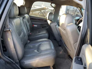 2003 Cadillac Escalade z VIN 1GYEC63TX3R135227, wystawiony jako Copart lot #88373245 z przebiegiem 258 595 mil mil oraz Czysty tytuł • Clean title. Historia ofert i sprzedaży dostępna na DreamBid. Obrazek 11.