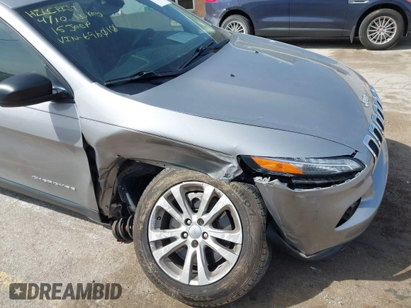 2015 Jeep Cherokee Sport with VIN 1C4PJLAB2FW696010, listed as a IAAI auction lot 42032956 with 88,323 mi miles. Bid and sale history available at carsss.com. Image 6.