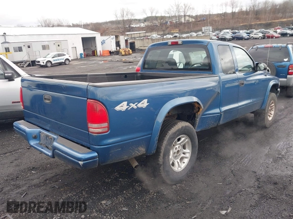 2003 Dodge Dakota Sport with VIN 1D7HG32NX3S322085, listed as a IAAI auction lot 41780125 with 95,321 mi miles. Bid and sale history available at carsss.com. Image 4.