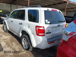2009 Ford Escape Hybrid with VIN 1FMCU49399KC19803, listed as a IAAI auction lot 42004776 with 163,353 mi miles and . Bid and sale history available at DreamBid. Image 3.