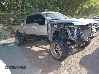 2017 Ford F-250 Lariat z VIN 1FT7W2BT1HEC10492, wystawiony jako IAAI lot #40050454 z przebiegiem 135 877 mil mil oraz . Historia ofert i sprzedaży dostępna na DreamBid. Obrazek 1.