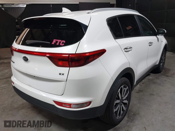 2019 Kia Sportage EX with VIN KNDPNCACXK7571757, listed as a IAAI auction lot 41919955 with 80,895 mi miles. Bid and sale history available at carsss.com. Image 4.