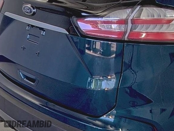 2020 Ford Edge Titanium z VIN 2FMPK3K91LBB37761, wystawiony jako IAAI lot #42829390 z przebiegiem 90 117 mil mil oraz . Historia ofert i sprzedaży dostępna na DreamBid. Obrazek 32.
