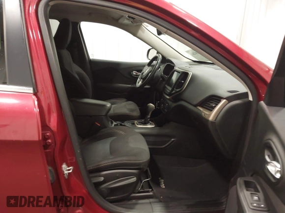 2015 Jeep Cherokee Latitude with VIN 1C4PJLCB6FW616477, listed as a IAAI auction lot 41812431 with 131,234 mi miles. Bid and sale history available at carsss.com. Image 5.