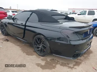 2014 BMW M6 z VIN WBSLZ9C58ED651156, wystawiony jako IAAI lot #41526192 z przebiegiem 90 642 mil mil oraz . Historia ofert i sprzedaży dostępna na DreamBid. Obrazek 3.