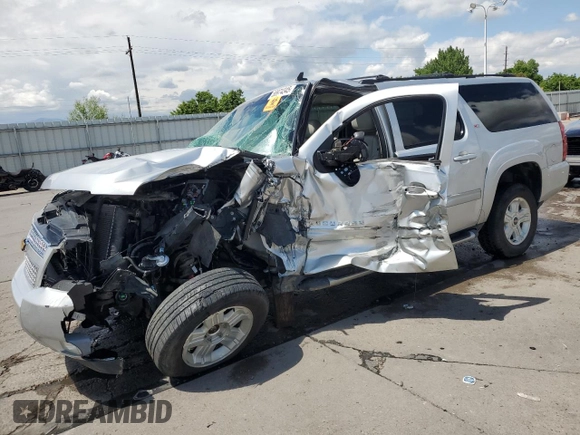 2011 Chevrolet Suburban LT with VIN 1GNSKJE31BR224959, listed as a Copart auction lot 58974345 with Not provided miles and Salvage title. Bid and sale history available at DreamBid. Image 1.