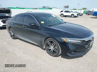 2021 Honda Accord Touring z VIN 1HGCV2F91MA005385, wystawiony jako IAAI lot #42004110 z przebiegiem 108 328 mil mil oraz . Historia ofert i sprzedaży dostępna na DreamBid. Obrazek 1.