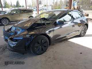 2025 Tesla Model 3 Long Range with VIN 5YJ3E1EA4SF987552, listed as a IAAI auction lot 41959743 with 187 mi miles and . Bid and sale history available at DreamBid. Image 2.