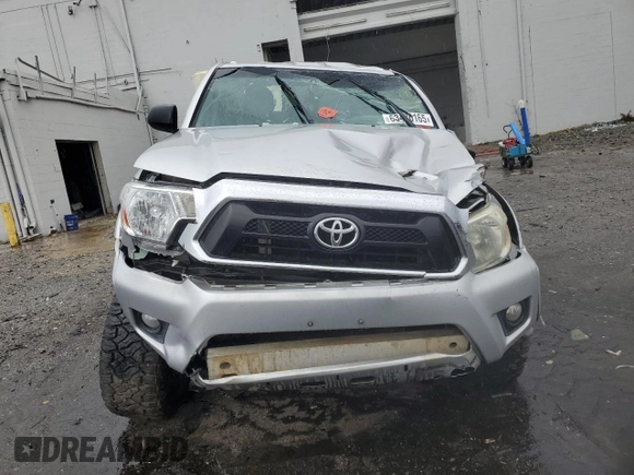 2013 Toyota Tacoma with VIN 5TFLU4EN8DX065656, listed as a Copart auction lot 63486165 with 185,018 mi miles and Salvage title. Bid and sale history available at DreamBid. Image 5.