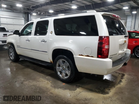 2010 Chevrolet Suburban LTZ with VIN 1GNUKKE33AR291270, listed as a Copart auction lot 86120904 with 239,255 mi miles and Salvage Title. Bid and sale history available at carsss.com. Image 2.