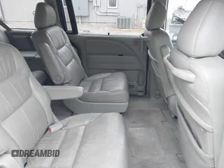 2007 Honda Odyssey EX-L with VIN 5FNRL38627B413638, listed as a IAAI auction lot 41960963 with 172,968 mi miles and . Bid and sale history available at DreamBid. Image 8.
