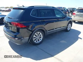 2018 Volkswagen Tiguan SEL with VIN 3VV3B7AX3JM064061, listed as a IAAI auction lot 41772564 with 95,395 mi miles and . Bid and sale history available at DreamBid. Image 4.