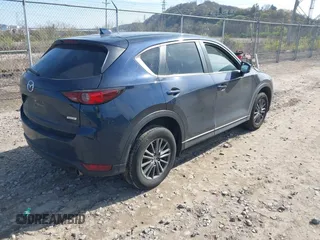 2019 Mazda CX-5 Touring with VIN JM3KFBCM8K0518806, listed as a IAAI auction lot 42038168 with 61,449 mi miles and . Bid and sale history available at DreamBid. Image 4.
