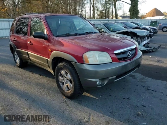 2001 Mazda Tribute LX with VIN 4F2CU08111KM19933, listed as a Copart auction lot 81174614 with 209,736 mi miles and Salvage Title. Bid and sale history available at DreamBid. Image 12.