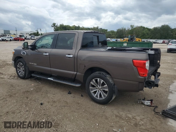2017 Nissan Titan SV z VIN 1N6AA1E64HN517933, wystawiony jako Copart lot #72793864 z przebiegiem 60 572 mil mil oraz Szkoda całkowita • Salvage title. Historia ofert i sprzedaży dostępna na DreamBid. Obrazek 2.