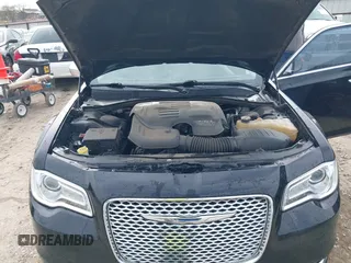 2015 Chrysler 300 C with VIN 2C3CCAEG8FH908477, listed as a IAAI auction lot 41702256 with 140,017 mi miles and . Bid and sale history available at carsss.com. Image 10.