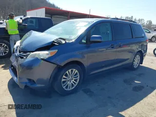 2013 Toyota Sienna XLE AAS with VIN 5TDYK3DC0DS398381, listed as a IAAI auction lot 41773688 with 169,055 mi miles. Bid and sale history available at carsss.com. Image 2.