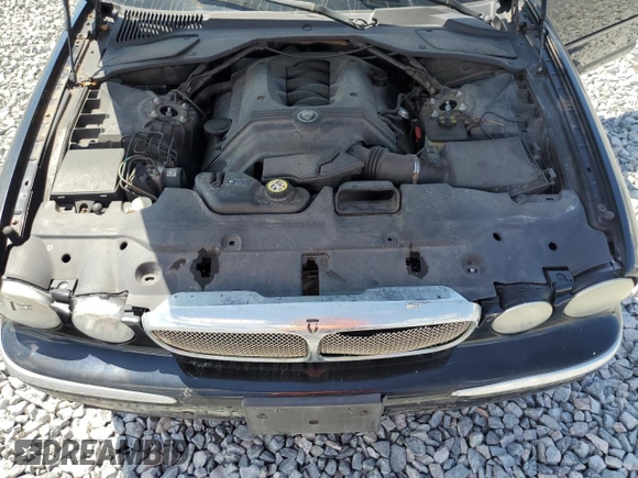 2004 Jaguar XJ with VIN SAJEA71C14SG10928, listed as a Copart auction lot 51202785 with 164,300 mi miles and Salvage Title. Bid and sale history available at carsss.com. Image 12.