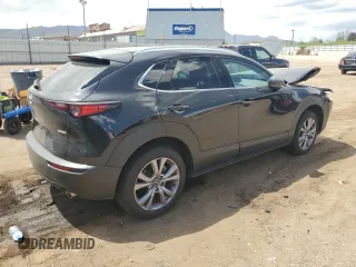 2023 Mazda CX-30 S Premium with VIN 3MVDMBDMXPM527113, listed as a Copart auction lot 57169165 with 49,040 mi miles and Salvage title. Bid and sale history available at DreamBid. Image 3.