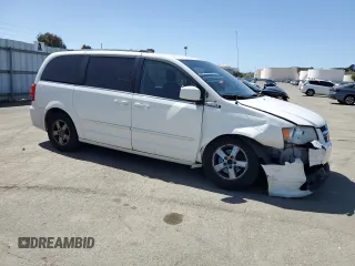 2011 Dodge Grand Caravan Crew with VIN 2D4RN5DG4BR699707, listed as a Copart auction lot 52055425 with 144,904 mi miles and Salvage Title. Bid and sale history available at DreamBid. Image 4.