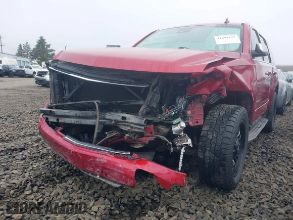 2015 Chevrolet Tahoe LTZ z VIN 1GNSKCKC6FR276531, wystawiony jako IAAI lot #41692617 z przebiegiem 124 010 mil mil oraz . Historia ofert i sprzedaży dostępna na DreamBid. Obrazek 6.