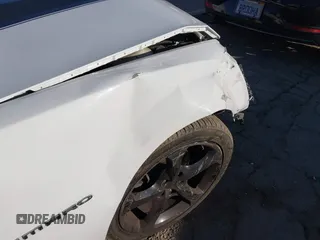 2014 Chevrolet Camaro LT z VIN 2G1FC1E39E9321549, wystawiony jako IAAI lot #41582840 z przebiegiem 129 495 mil mil oraz . Historia ofert i sprzedaży dostępna na DreamBid. Obrazek 20.