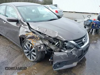 2016 Nissan Altima S with VIN 1N4AL3APXGC266407, listed as a IAAI auction lot 41727634 with 127,936 mi miles and . Bid and sale history available at DreamBid. Image 6.