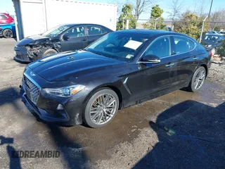 2019 Genesis G70 2.0T Advanced with VIN KMTG34LA0KU032218, listed as a IAAI auction lot 41527763 with 69,501 mi miles. Bid and sale history available at carsss.com. Image 2.