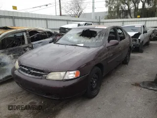 1998 Nissan Altima XE with VIN 1N4DL01D8WC266874, listed as a Copart auction lot 48636595 with 0 mi miles and Salvage Title. Bid and sale history available at carsss.com. Image 1.