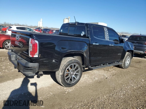 2020 GMC Canyon 4WD Denali with VIN 1GTG6EEN2L1131363, listed as a Copart auction lot 83033354 with 52,694 mi miles and Salvage Title. Bid and sale history available at carsss.com. Image 3.