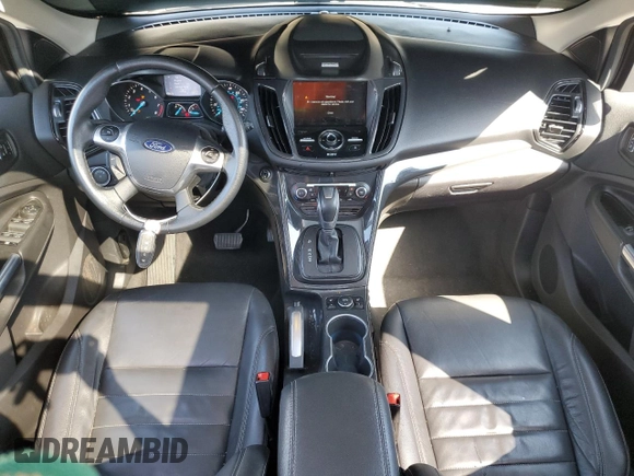 2016 Ford Escape Titanium with VIN 1FMCU0J99GUB83458, listed as a Copart auction lot 48828195 with 74,250 mi miles and Salvage Title. Bid and sale history available at carsss.com. Image 8.