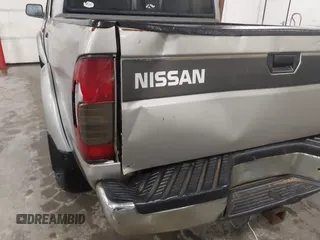 2000 Nissan Frontier XE z VIN 1N6ED27T8YC314914, wystawiony jako IAAI lot #42396047 z przebiegiem 182 486 mil mil oraz . Historia ofert i sprzedaży dostępna na DreamBid. Obrazek 6.