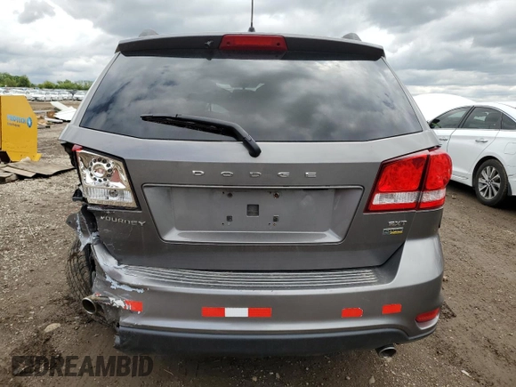 2012 Dodge Journey SXT z VIN 3C4PDCBG3CT213515, wystawiony jako Copart lot #58128845 z przebiegiem 208 152 mil mil oraz Szkoda całkowita • Salvage title. Historia ofert i sprzedaży dostępna na DreamBid. Obrazek 6.
