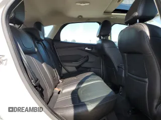 2014 Ford Focus Titanium z VIN 1FADP3N27EL161613, wystawiony jako Copart lot #56166805 z przebiegiem 140 336 mil mil oraz Szkoda całkowita • Salvage title. Historia ofert i sprzedaży dostępna na DreamBid. Obrazek 11.