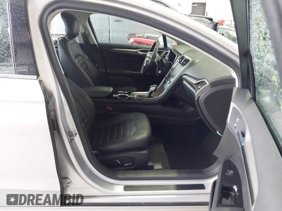 2013 Ford Fusion SE Hybrid with VIN 3FA6P0LU2DR319335, listed as a IAAI auction lot 42007573 with 135,099 mi miles. Bid and sale history available at carsss.com. Image 5.
