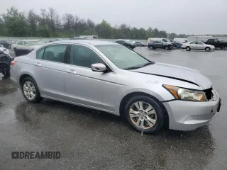 2009 Honda Accord LX-P with VIN 1HGCP26439A152751, listed as a Copart auction lot 60191995 with 152,834 mi miles and Salvage title. Bid and sale history available at DreamBid. Image 4.