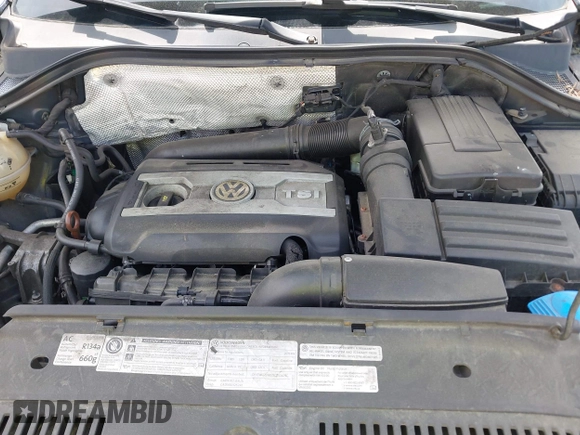 2012 Volkswagen Tiguan S with VIN WVGBV7AX3CW571039, listed as a IAAI auction lot 41928361 with 165,938 mi miles and . Bid and sale history available at DreamBid. Image 10.