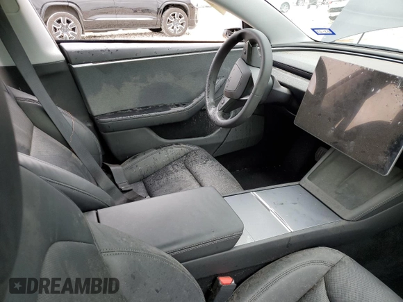 2024 Tesla Model 3 with VIN 5YJ3E1EA0RF739034, listed as a Copart auction lot 49830575 with 17,888 mi miles and Salvage Title. Bid and sale history available at DreamBid. Image 7.