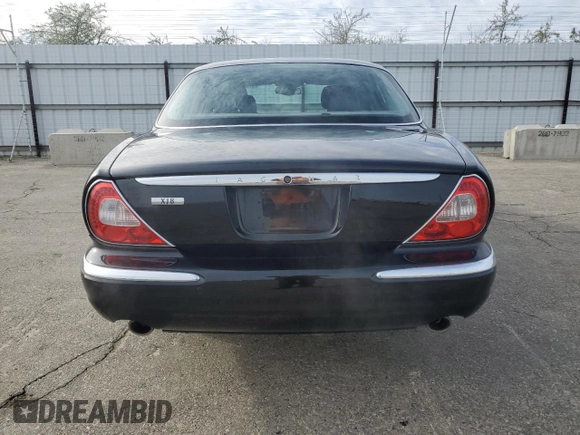 2004 Jaguar XJ with VIN SAJEA71C94SG11566, listed as a Copart auction lot 85281684 with 107,054 mi miles and Clean Title. Bid and sale history available at carsss.com. Image 6.