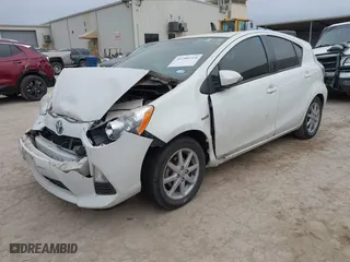 2014 Toyota Prius c One with VIN JTDKDTB31E1559712, listed as a IAAI auction lot 41286514 with 173,321 mi miles. Bid and sale history available at carsss.com. Image 17.