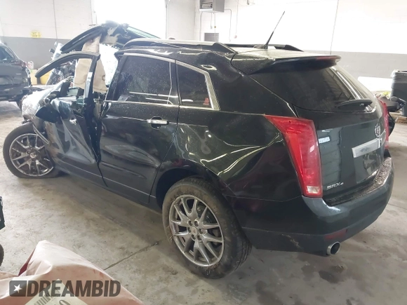 2014 Cadillac SRX Premium Collection with VIN 3GYFNGE35ES636852, listed as a IAAI auction lot 42283604 with 167,983 mi miles and . Bid and sale history available at DreamBid. Image 3.
