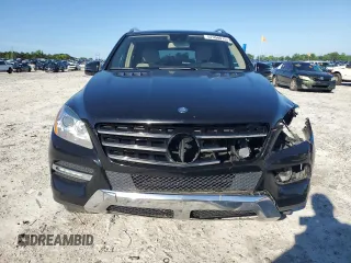 2015 Mercedes-Benz M 350 z VIN 4JGDA5JB5FA594871, wystawiony jako Copart lot #57958015 z przebiegiem 199 984 mil mil oraz Szkoda całkowita • Salvage title. Historia ofert i sprzedaży dostępna na DreamBid. Obrazek 5.