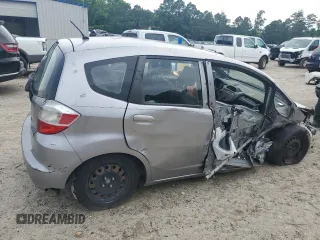2009 Honda Fit with VIN JHMGE88249S025083, listed as a Copart auction lot 58121945 with Not provided miles and Salvage title. Bid and sale history available at DreamBid. Image 3.