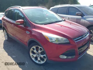 2016 Ford Escape Titanium with VIN 1FMCU9JX7GUA89405, listed as a IAAI auction lot 42631868 with 156,539 mi miles and . Bid and sale history available at DreamBid. Image 1.