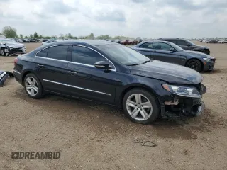2014 Volkswagen CC Sport z VIN WVWBN7AN5EE501201, wystawiony jako Copart lot #56541045 z przebiegiem 92 765 mil mil oraz Szkoda całkowita • Salvage title. Historia ofert i sprzedaży dostępna na DreamBid. Obrazek 4.
