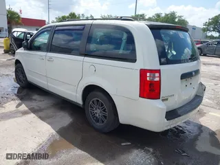 2010 Dodge Grand Caravan SE with VIN 2D4RN4DE5AR490306, listed as a IAAI auction lot 41944376 with 127,107 mi miles. Bid and sale history available at carsss.com. Image 3.