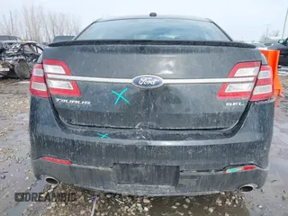 2013 Ford Taurus SEL with VIN 1FAHP2E86DG135835, listed as a IAAI auction lot 41665430 with 130,816 mi miles. Bid and sale history available at carsss.com. Image 6.