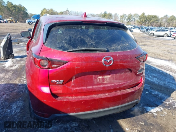 2017 Mazda CX-5 Touring with VIN JM3KFBCL1H0227290, listed as a IAAI auction lot 41400188 with 58,801 mi miles. Bid and sale history available at carsss.com. Image 16.