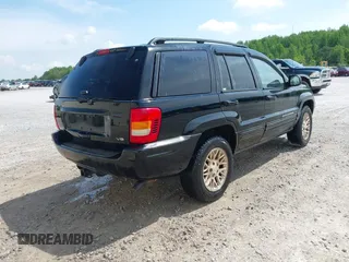 2002 Jeep Grand Cherokee Limited with VIN 1J8GX58N32C130002, listed as a IAAI auction lot 42179840 with 246,661 mi miles and . Bid and sale history available at DreamBid. Image 4.